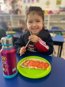 Our K1 kids enjoyed a nice italian pizza in Cooking Class!